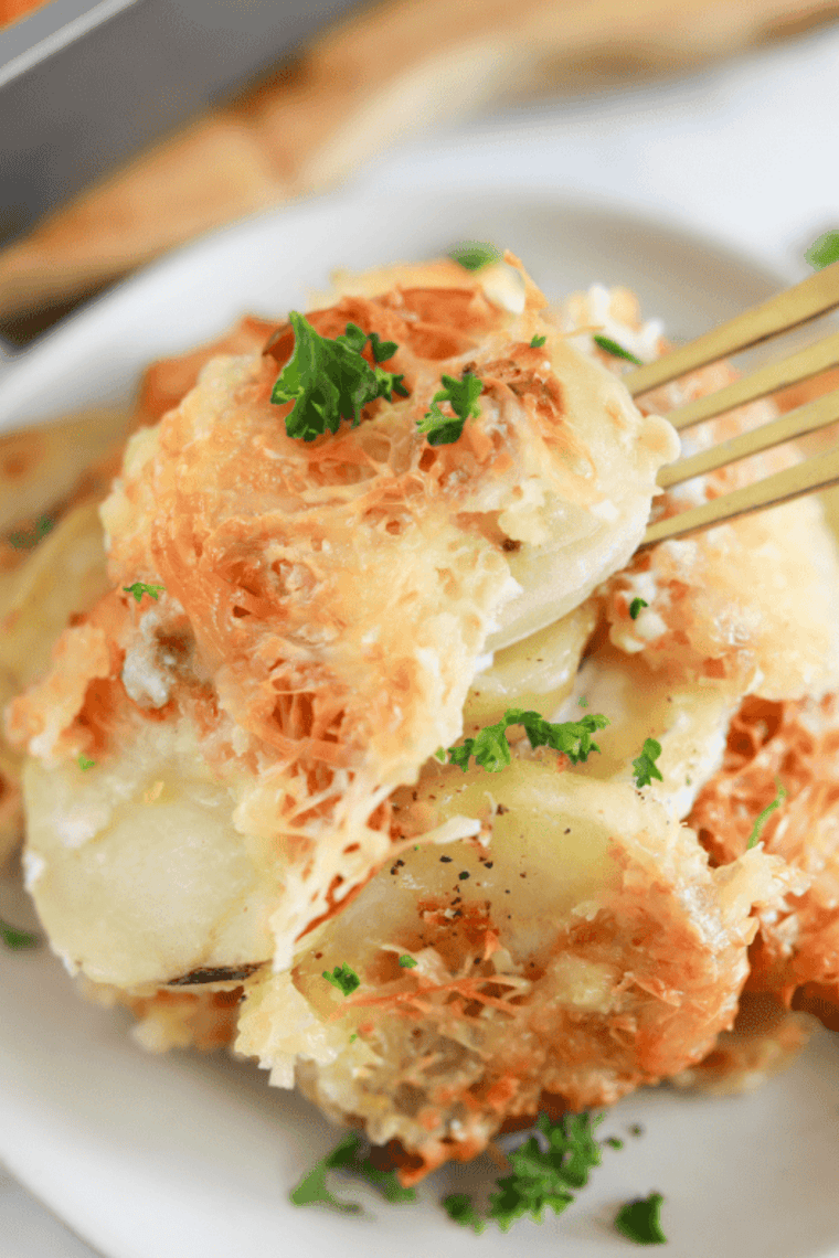 Crushed potato chip or panko topping sprinkled over au gratin potatoes