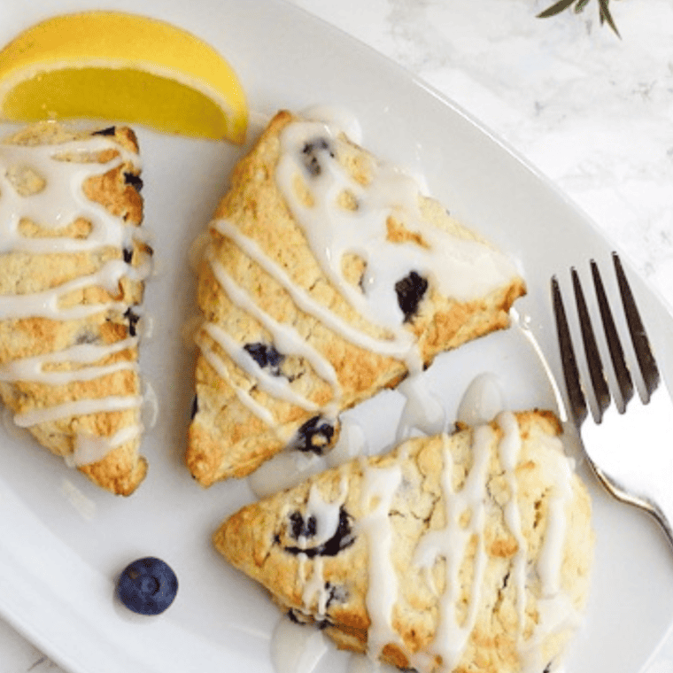 Fluffy scones drizzled with sweet vanilla glaze