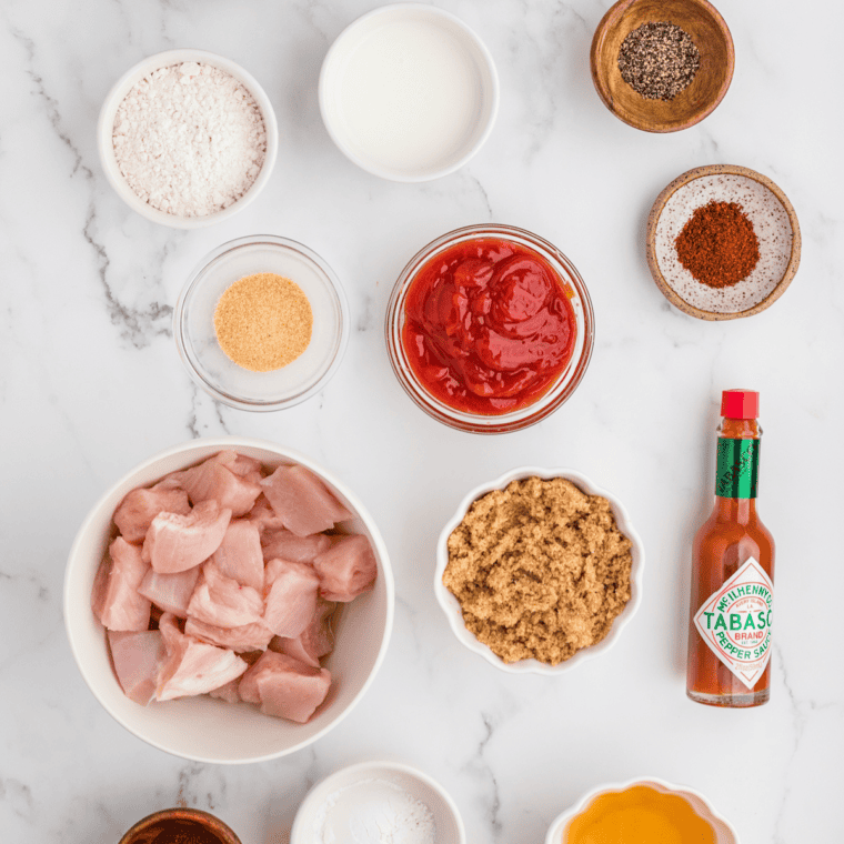 Ingredients needed for Air Fryer BBQ Popcorn Chicken on kitchen table.
