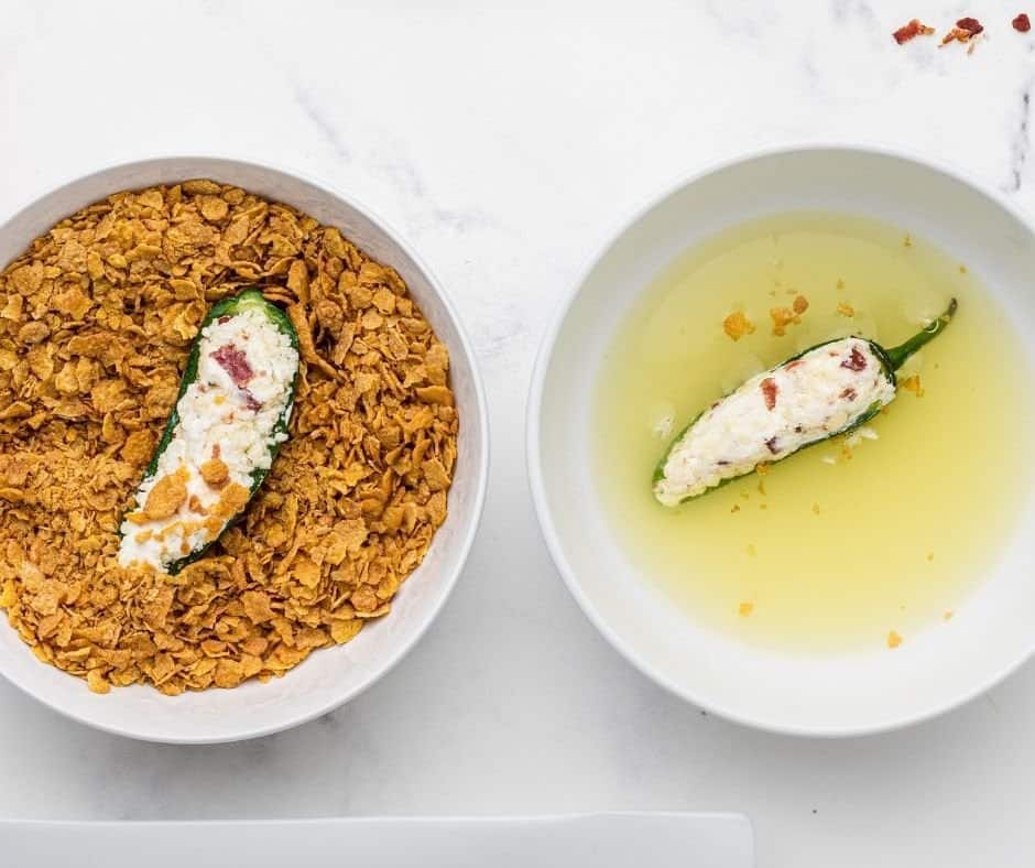 Egg White and Cornflake Crumbs in Bowl