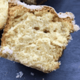 Homemade copycat Trader Joe’s Pancake Bread sliced on a cutting board with a cinnamon-streusel topping.