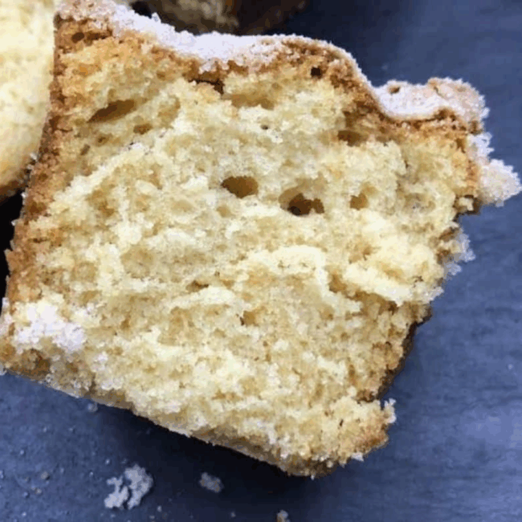 Air Fryer Copycat Trader Joe’s Pancake Bread topped with cinnamon crumble and sliced on a wooden board.