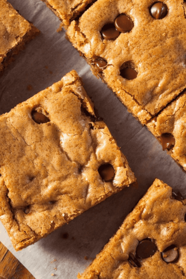 Golden, chewy chocolate chip cookie bars made in the air fryer with melted chocolate chips throughout.