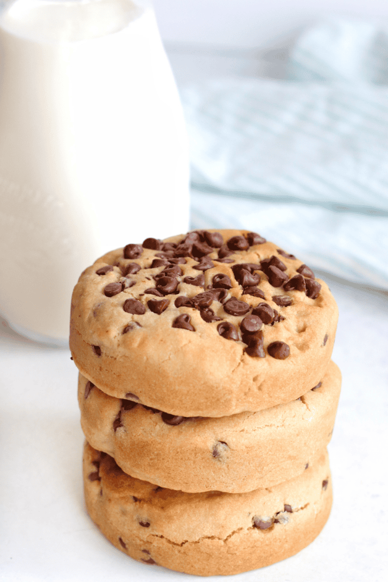 Golden-brown oatmeal cookies with melty chocolate chips fresh from the air fryer, ready to enjoy.