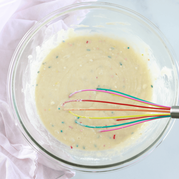 Prep the Pan – Greasing air fryer-safe muffin tin or lining with cupcake liners.