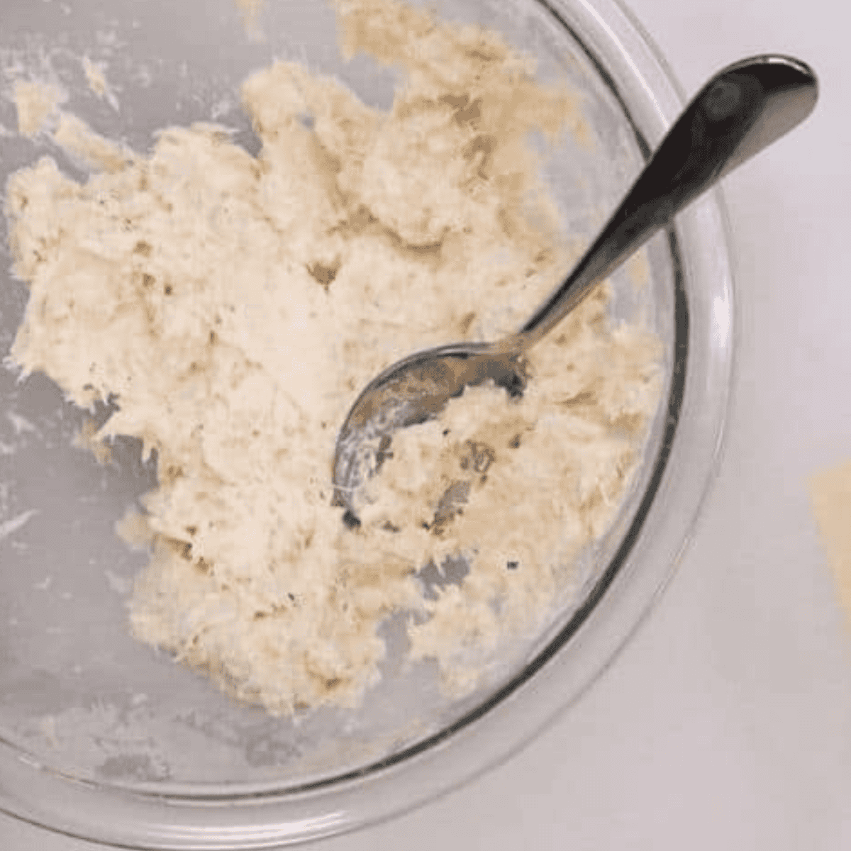 In a large mixing bowl, add the cream cheese and crab meat and mix until well incorporated.