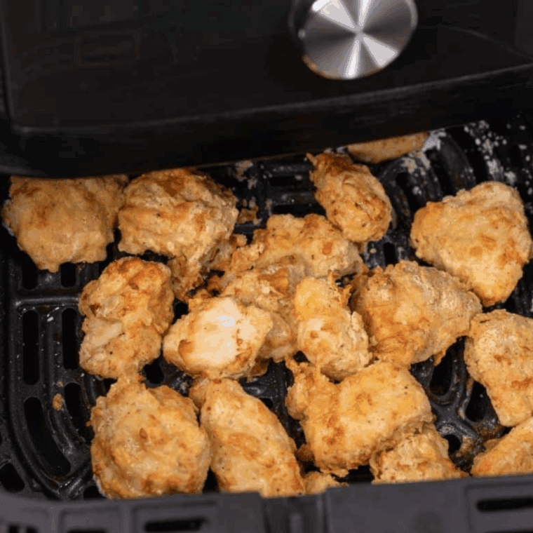 Cooked PF Chang’s Sweet And Sour Chicken Recipe in the air fryer basket.