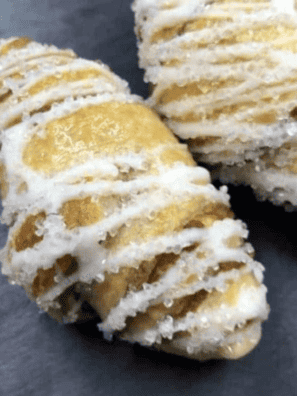 Air Fryer Cinnamon Sugar Croissants -- Air Fryer Cinnamon Sugar Croissants are a delightful twist on a classic pastry favorite. These delectable treats feature flaky, buttery croissants filled with a sweet and aromatic cinnamon sugar mixture. By using an air fryer, you can achieve a perfectly crisp and golden exterior while the inside remains soft and tender. Whether served for breakfast, brunch or as a delightful dessert, these croissants satisfy your cravings with their irresistible flavor and texture.