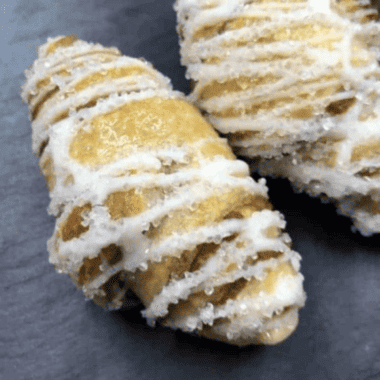 Air Fryer Cinnamon Sugar Croissants -- Air Fryer Cinnamon Sugar Croissants are a delightful twist on a classic pastry favorite. These delectable treats feature flaky, buttery croissants filled with a sweet and aromatic cinnamon sugar mixture. By using an air fryer, you can achieve a perfectly crisp and golden exterior while the inside remains soft and tender. Whether served for breakfast, brunch or as a delightful dessert, these croissants satisfy your cravings with their irresistible flavor and texture.