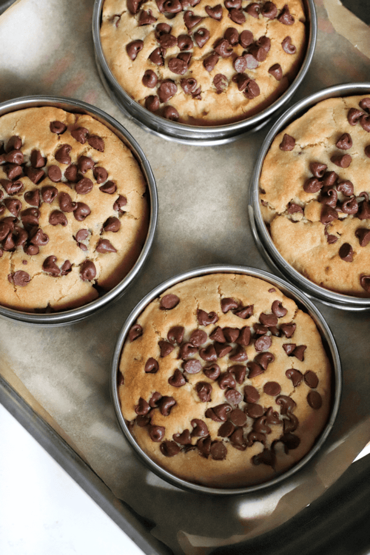 Homemade copycat McDonald’s chocolate chip cookies with soft centers and melted chocolate chips on a plate.