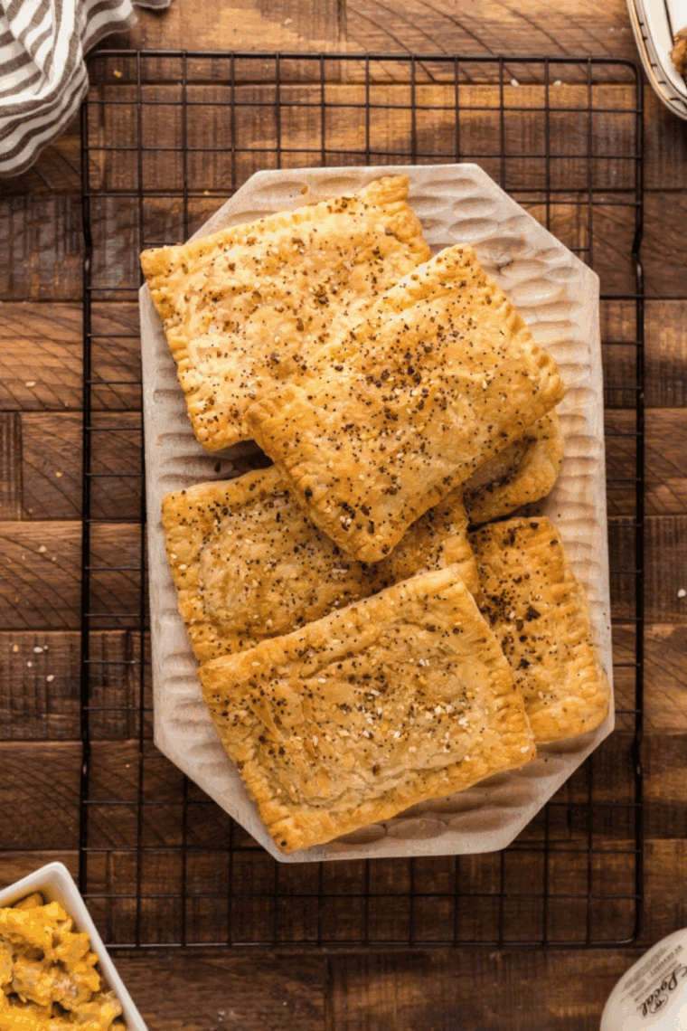 Air fryer sausage egg cheese toaster strudel on a plate