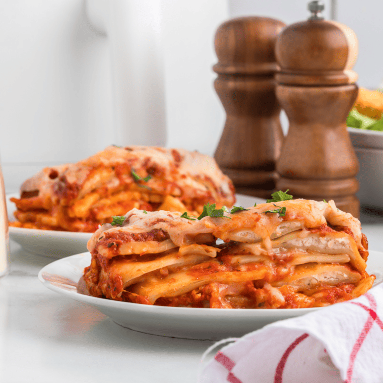 Golden, cheesy Air Fryer Ravioli Lasagna with layers of sauce and ravioli.