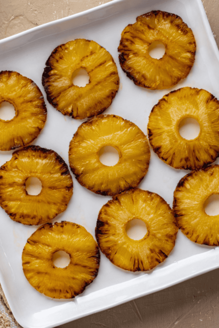 Caramelized Brazilian pineapple rings in an air fryer, golden and juicy.