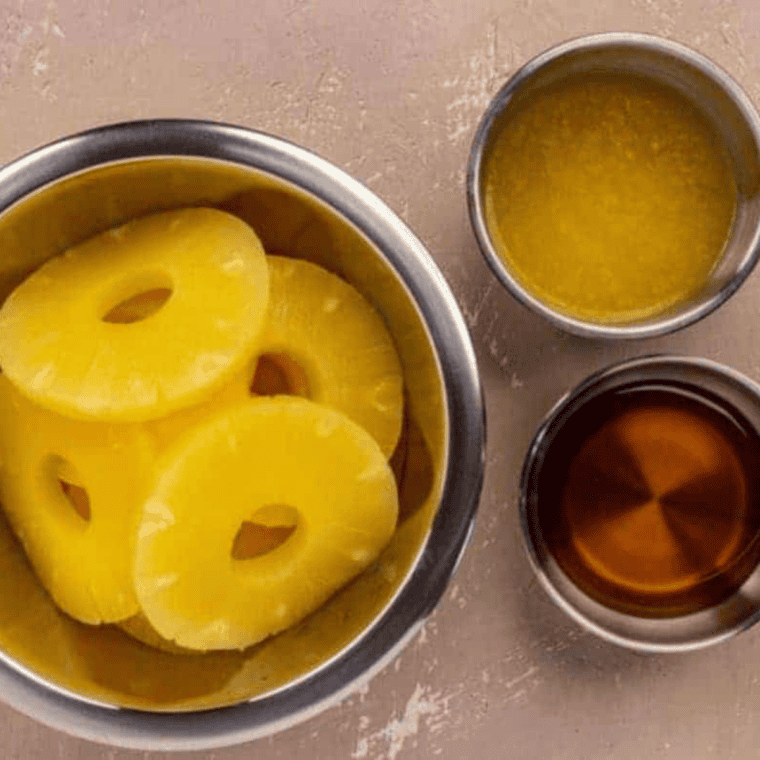 Ingredients needed for Easy Air Fryer Brazilian Pineapple Recipe on kitchen table.