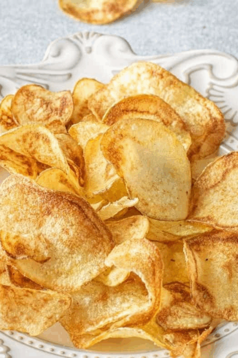 Crispy air fryer homemade Lay’s-style potato chips served in a bowl.