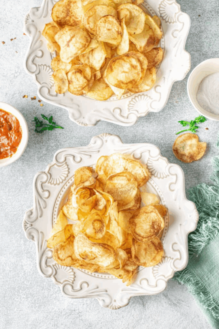 Golden, crispy air fryer homemade Lay’s-style potato chips in a bowl.