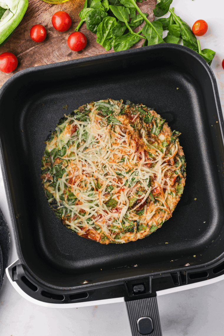 Testing the frittata’s doneness with a toothpick inserted in the center.