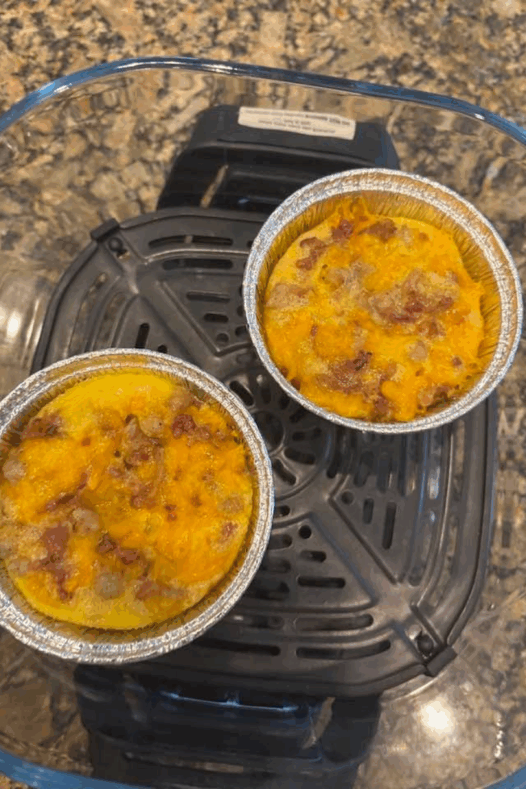 Ninja Crispi easy breakfast casserole with eggs and melted cheese ready to serve