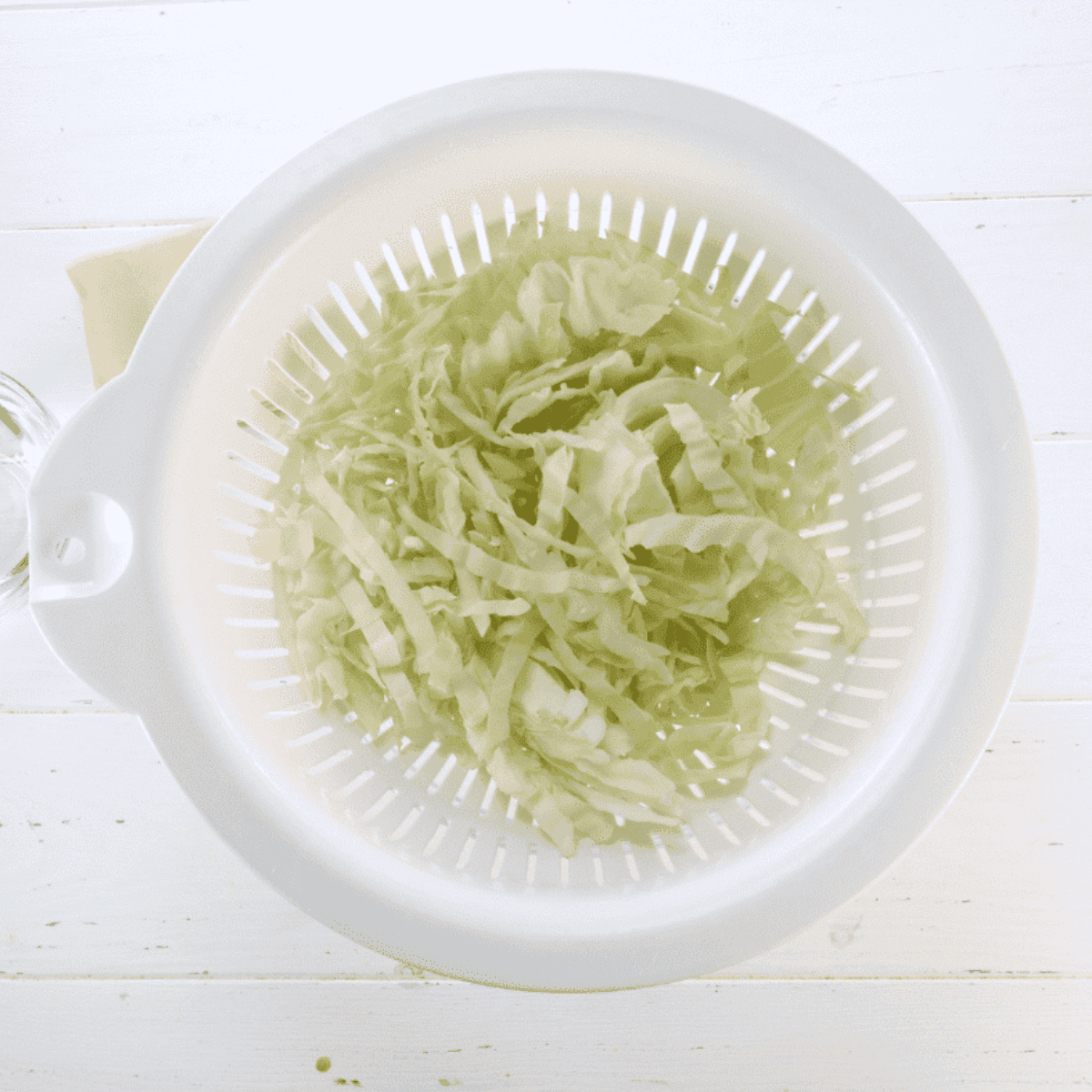 Add diced cabbage in the colander.