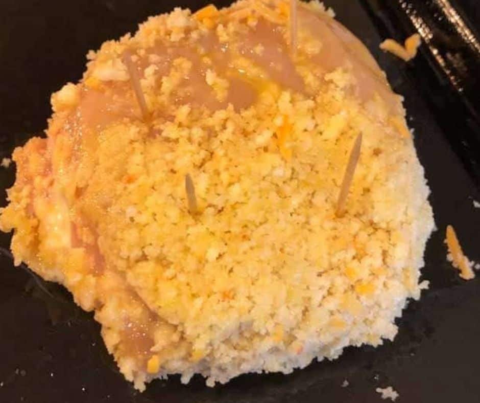 Chicken breasts stuffed with broccoli and cheese in the air fryer basket