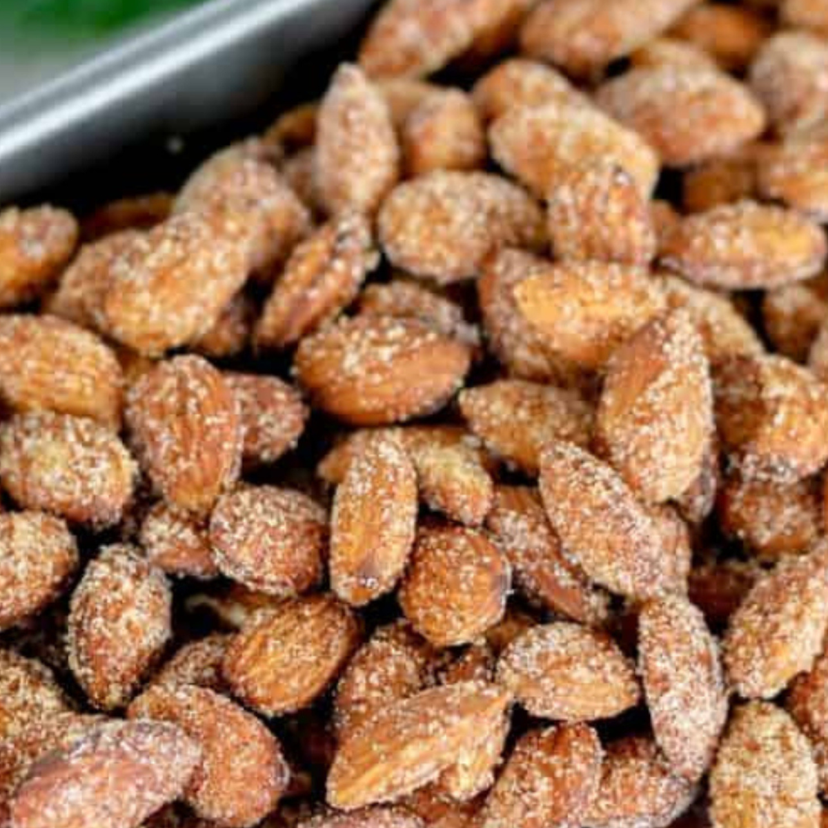 Close-up of golden brown Air Fryer Candied Almonds with a crunchy, caramelized coating