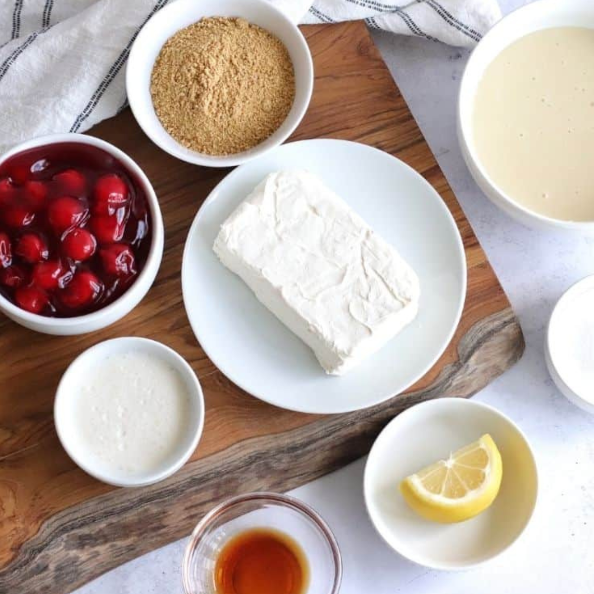 Ingredients needed for Air Fryer Cherry Cream Cheese Danish on kitchen table.