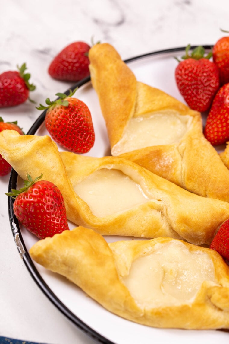 Air fryer cheese danish made with crescent rolls and a sweet cream cheese filling, cooled on a wire rack