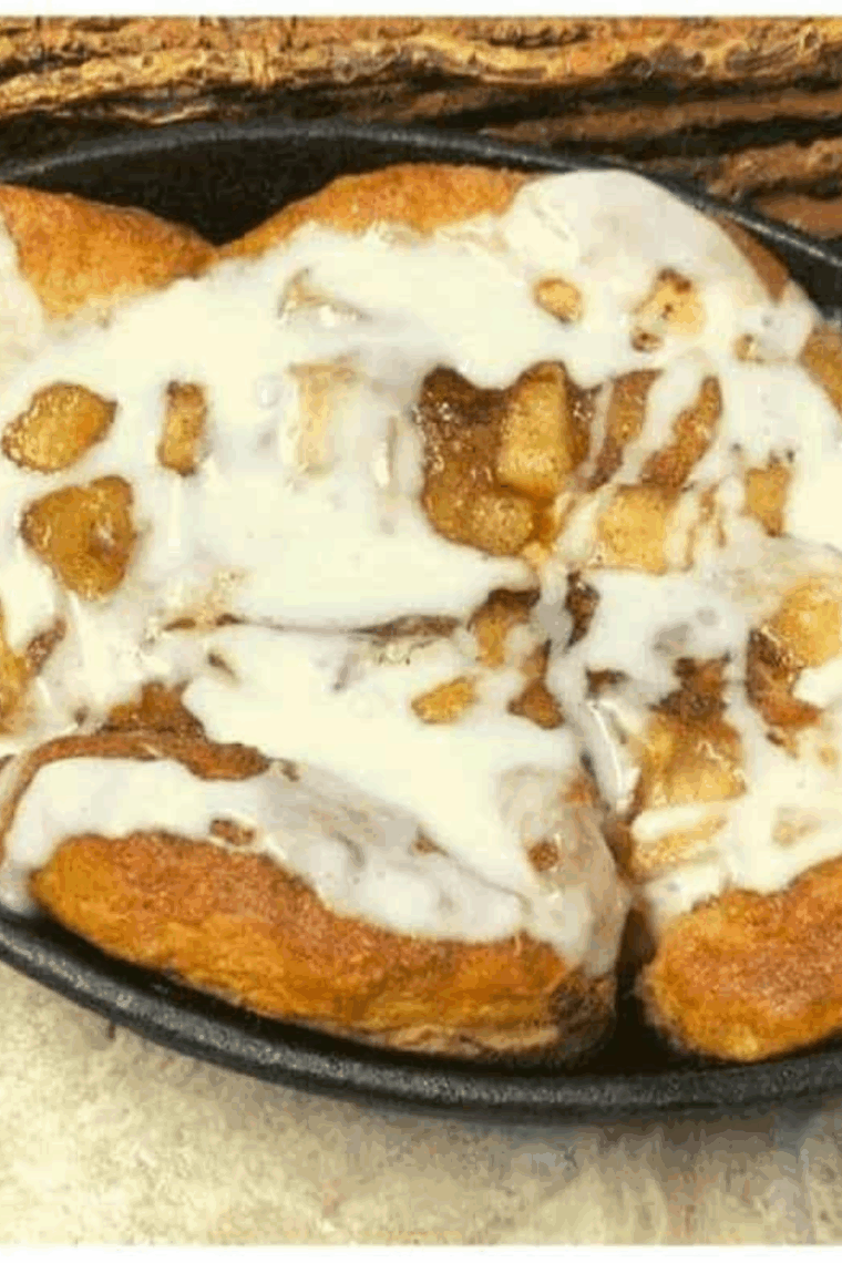 Air fryer skillet apple pie biscuit bites, golden and filled with cinnamon-spiced apples