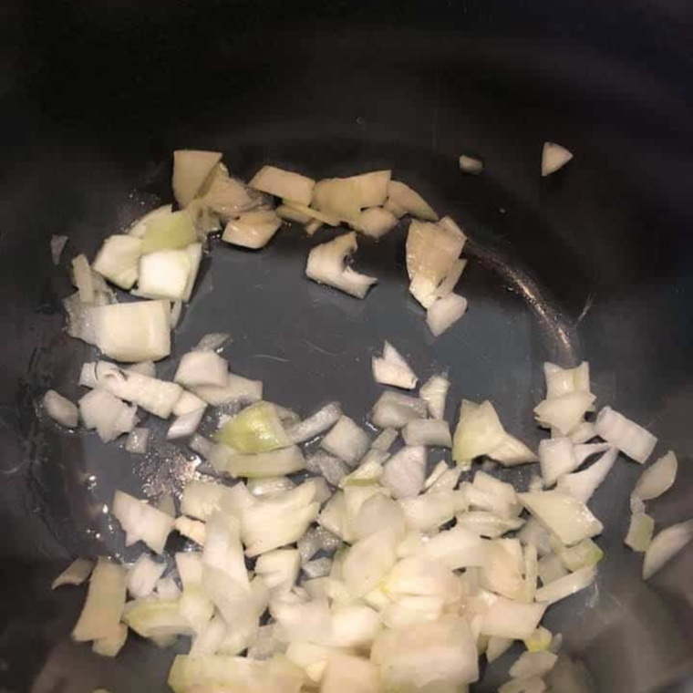 Sauting the onions in the instant pot bowl.
