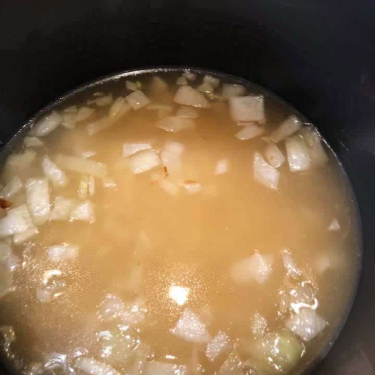 Adding the ingredients to the Instant Pot Bowl.