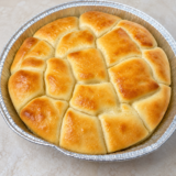 Plate of warm Sister Schubert's dinner rolls served after air frying