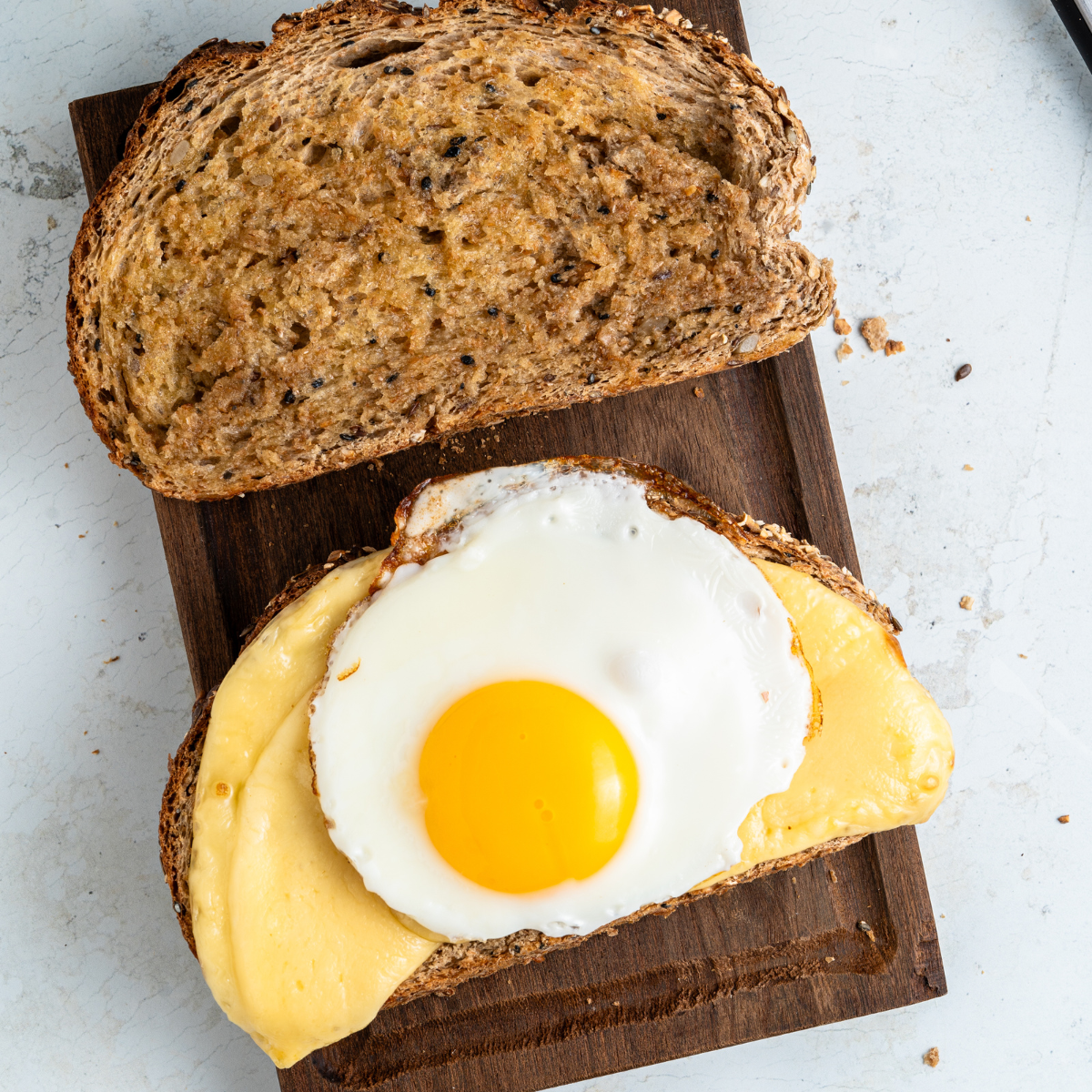 Easy air fryer breakfast grilled cheese with eggs and melted provolone on toasted bread