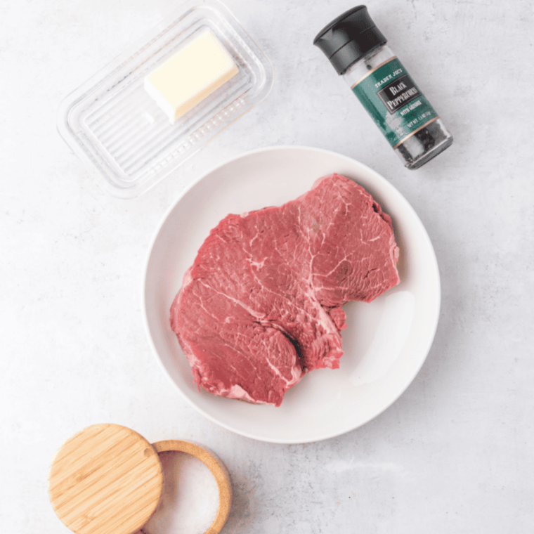 Ingredients needed for Air Fryer New York Strip Steak (Keto, with Boursin) on kitchen table.
