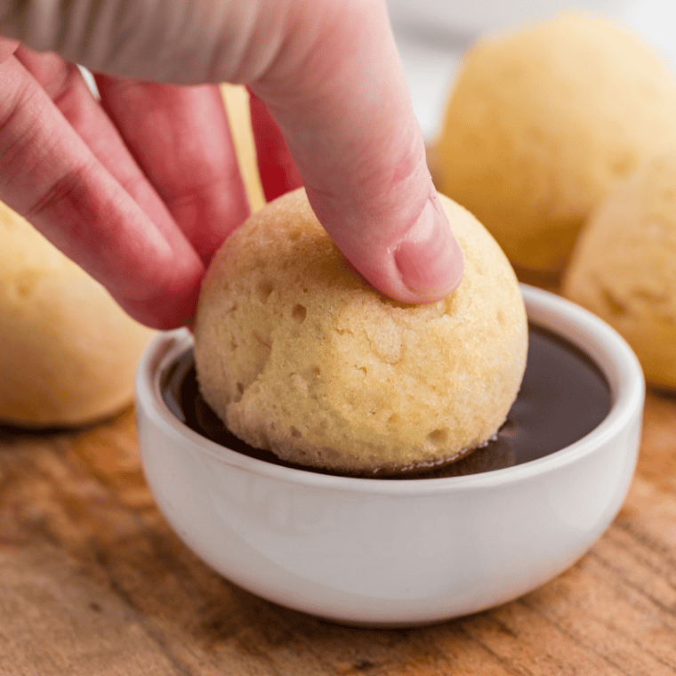 Golden, fluffy Air Fryer Pancake Bites stacked on a plate, perfect for a quick breakfast or snack.