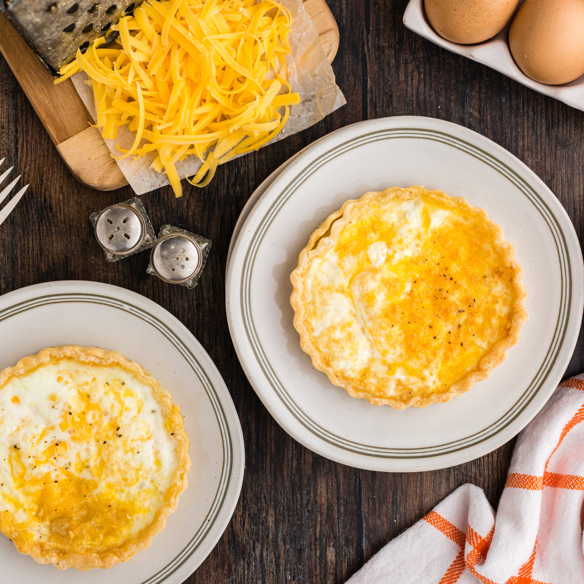 "Golden crusted La Madeleine Quiche Lorraine with bacon and cheese"