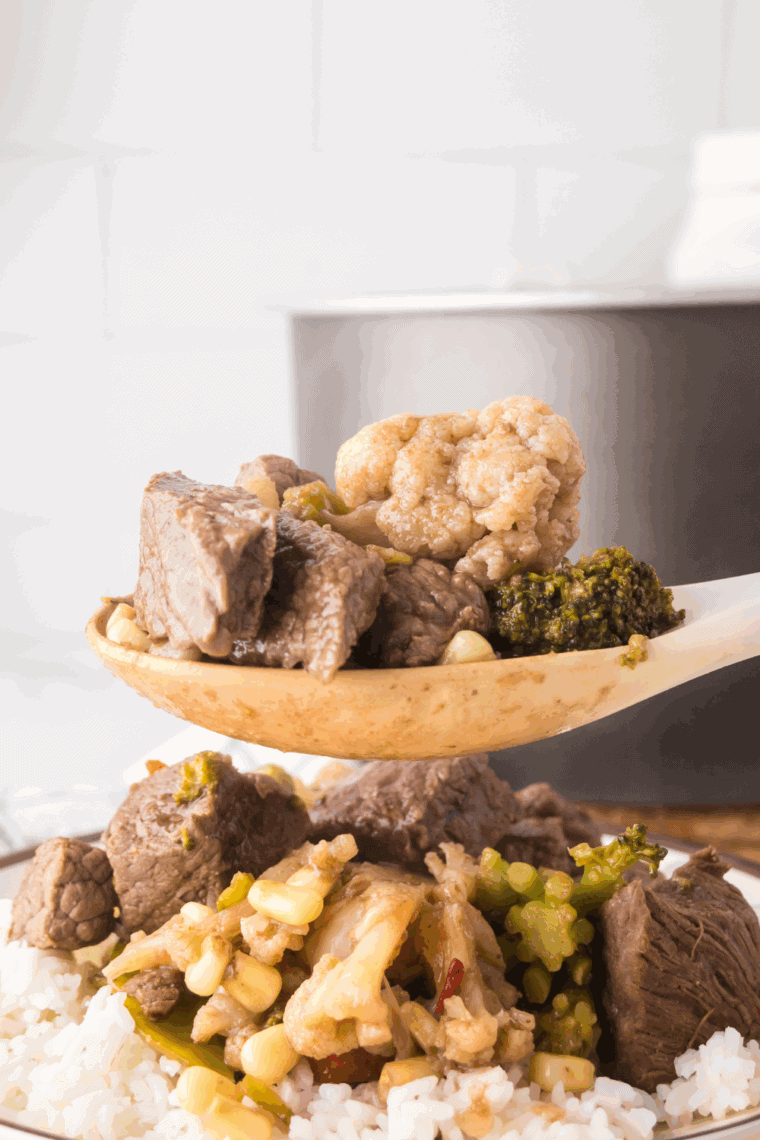 Ninja Foodi Beef Stir Fry with colorful vegetables in a skillet