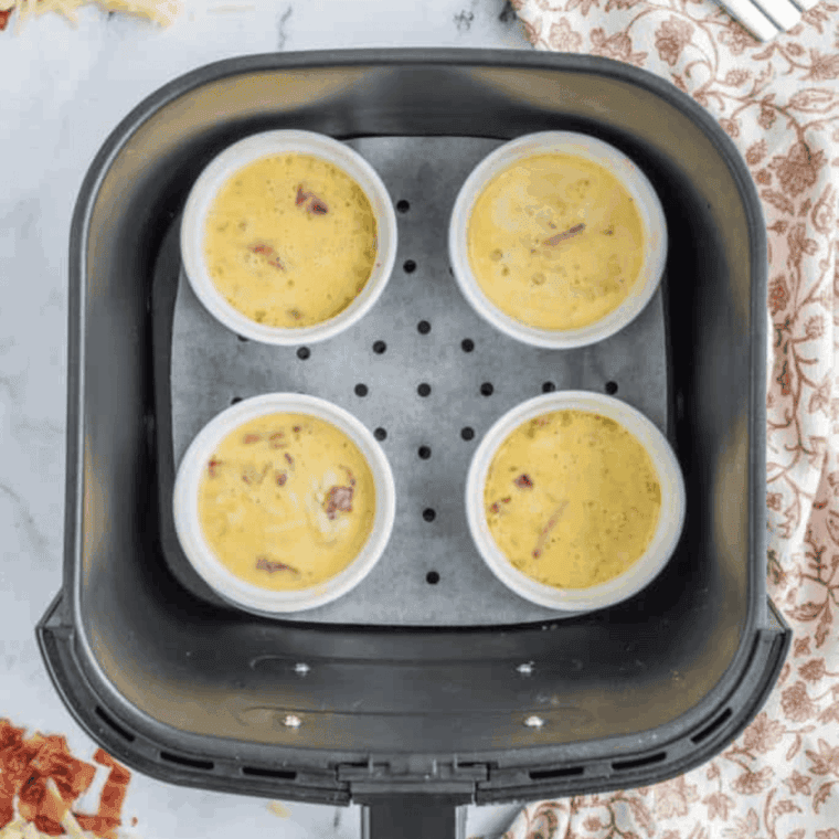Place Starbucks Italian Sausage Egg Bites in the air fryer basket.