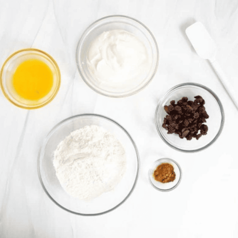 Ingredients For Air Fryer Cinnamon Raisin Bagels on table.