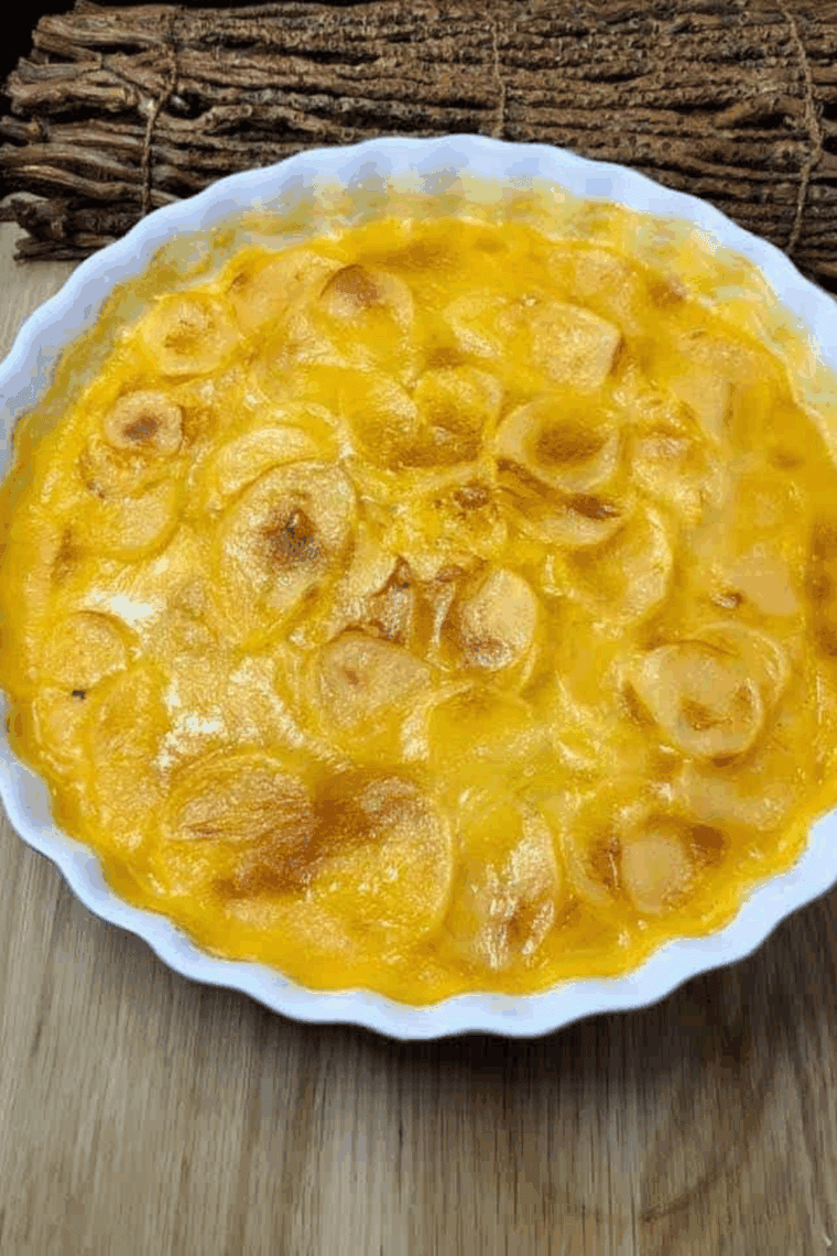 Boxed scalloped potatoes cooked in the air fryer with a golden, crispy top and creamy inside.