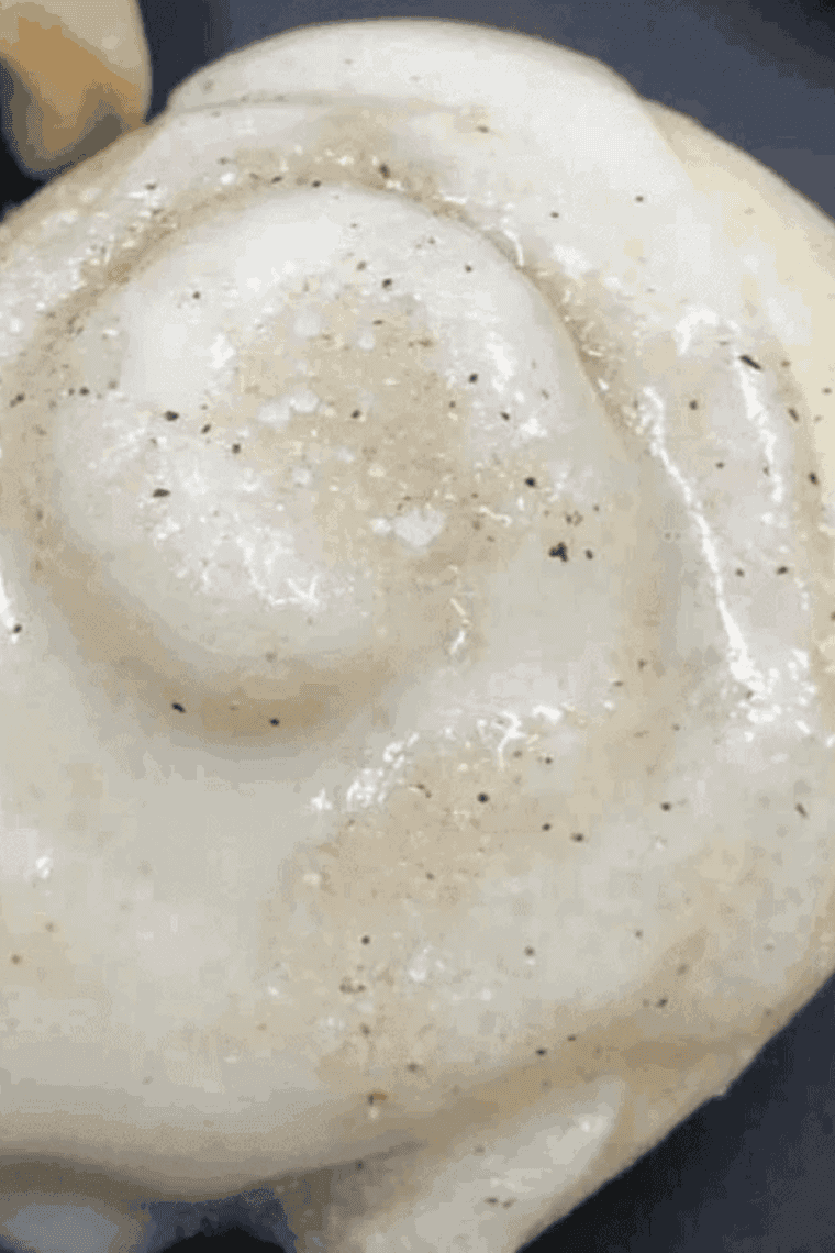 Golden cinnamon roll cookies fresh from the air fryer, soft and swirled with cinnamon sugar.