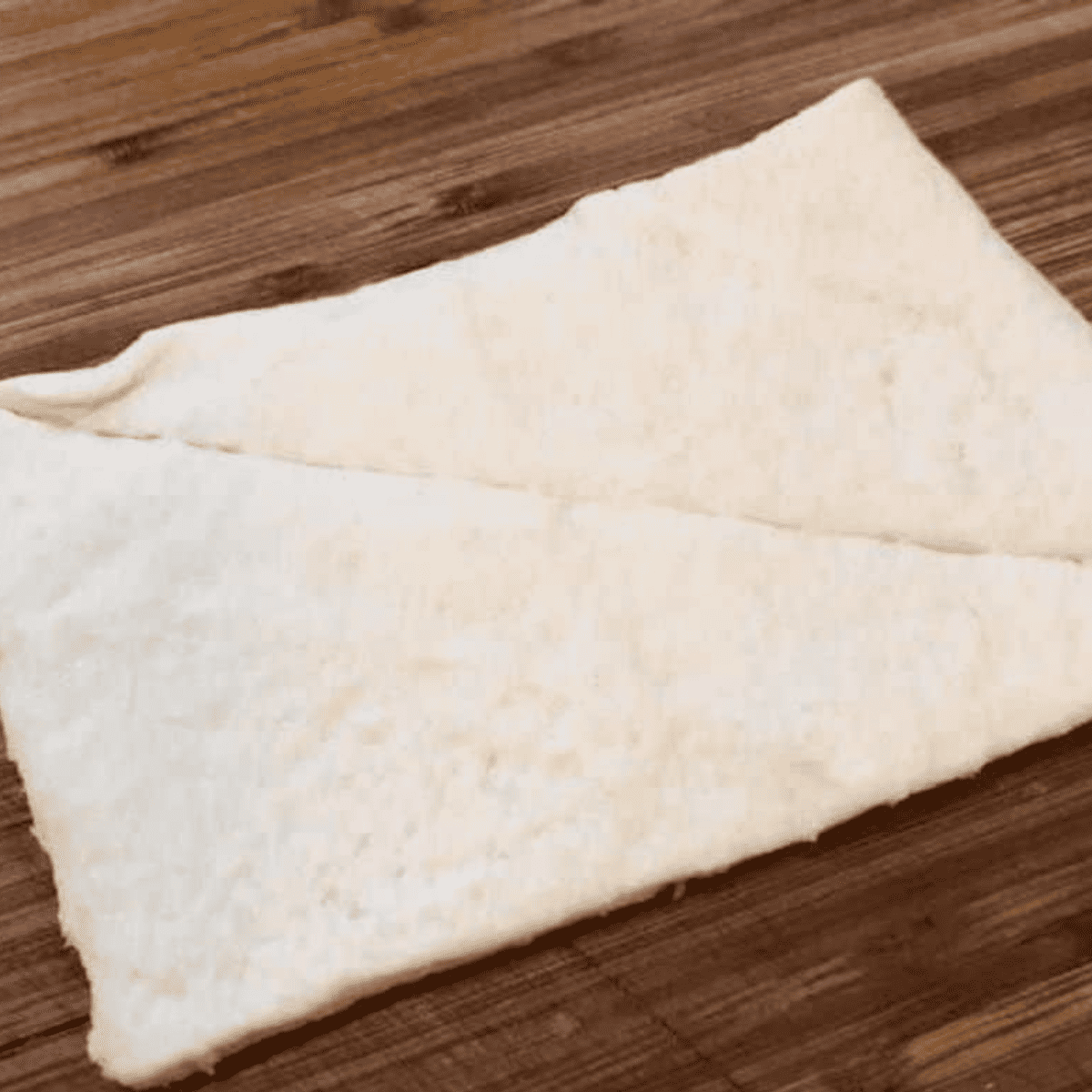 Layout the crescent dough on a cutting board.