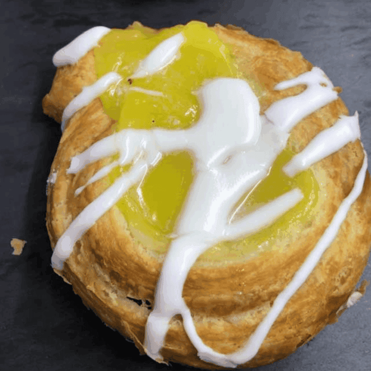 Golden, flaky Air Fryer Crescent Lemon Danish filled with tangy lemon and drizzled with glaze