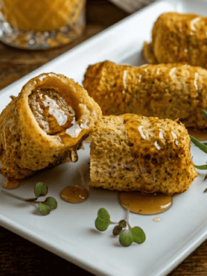 Air fryer French toast and sausage roll-ups are the breakfast that finally settles the sweet-versus-savory argument. A juicy breakfast sausage gets wrapped in soft bread, dipped in a cinnamon-vanilla egg batter, and air-fried until the outside is golden and crisp and the inside stays custardy — French toast and sausage in one dippable, handheld bite.