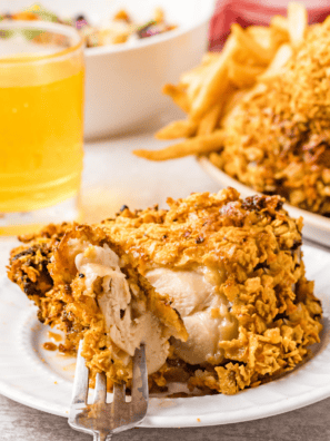 Air fryer French's crunchy onion chicken breast sliced to show juicy interior and golden crispy onion crust
