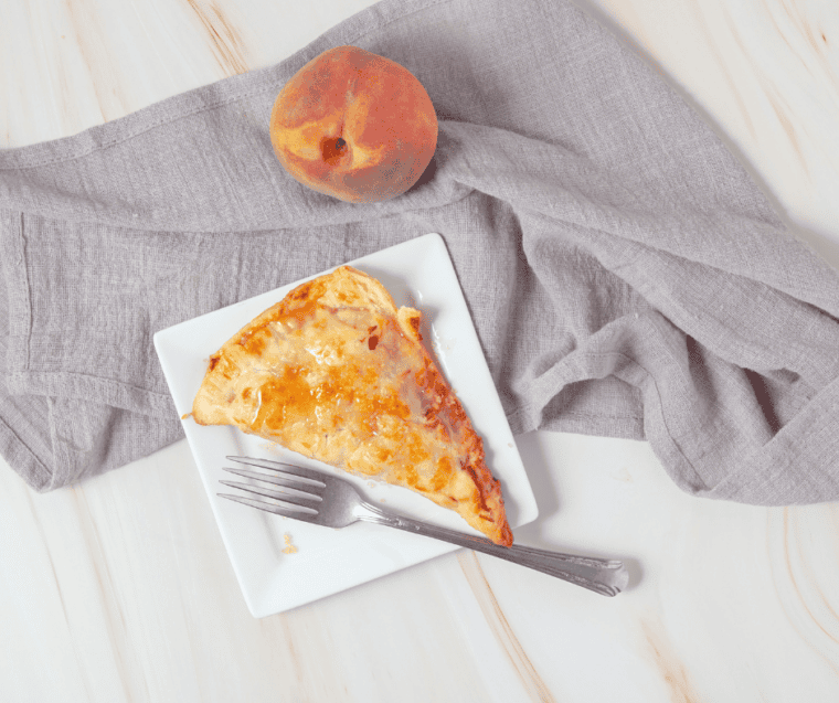 Bowl of diced fresh peaches for air fryer peach hand pie filling