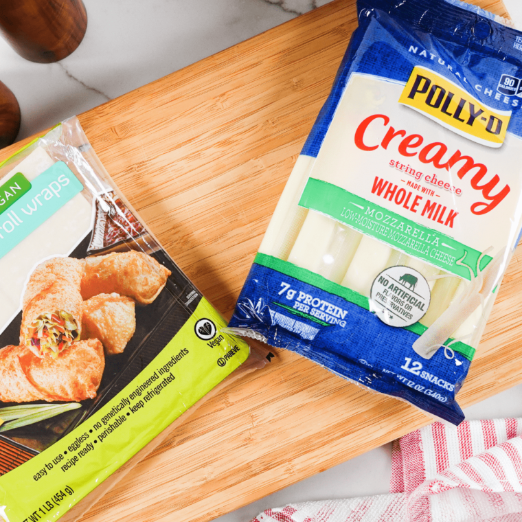 Ingredients needed for Air Fryer Wonton Mozzarella Sticks on kitchen table.