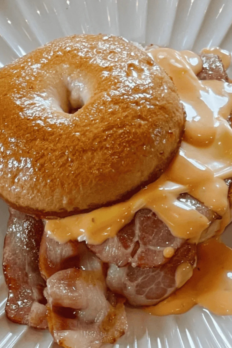 Easy Air Fryer Cheddar Cheese Bagels recipe — homemade Greek yogurt bagels topped with melted cheddar cheese, ready in 25 minutes.
