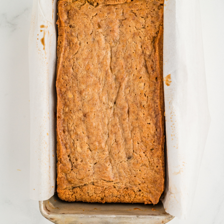 Baking mini banana nut loaf in air fryer at 320°F until golden and cooked through.