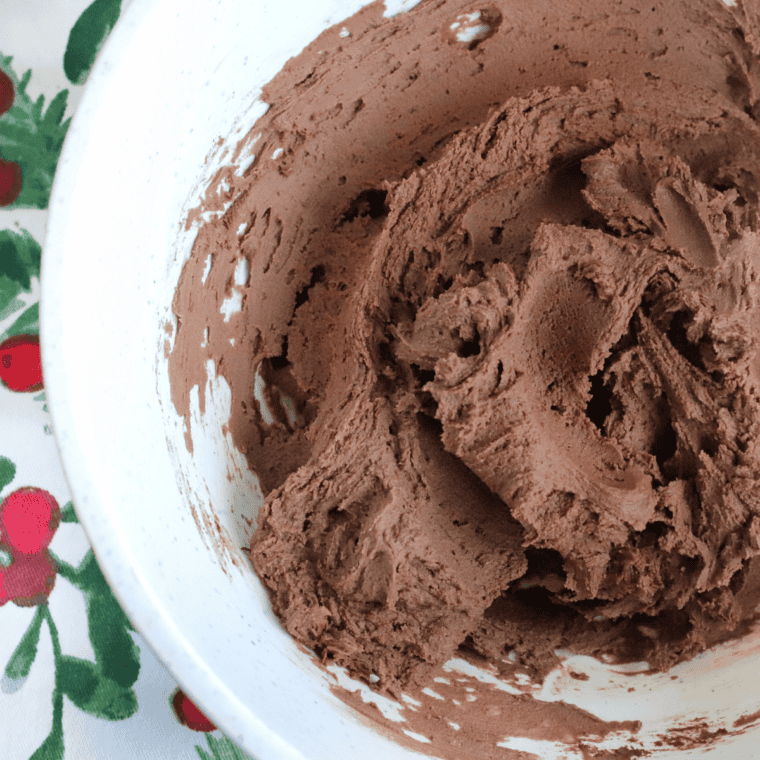 Large bowl with butter, brown sugar, and sugar being creamed together.