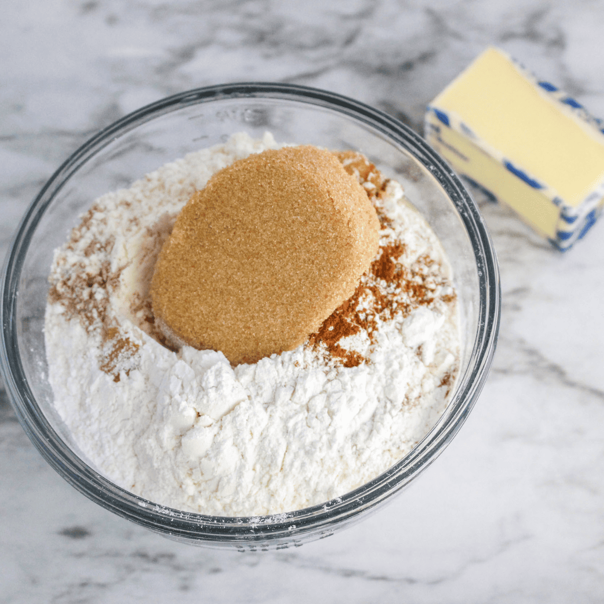 Flour and cubed butter pulsed to coarse crumbs in a food processor